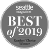 A circular gray emblem with "Seattle Magazine Best of 2019 Readers' Choice Winner" written on it.