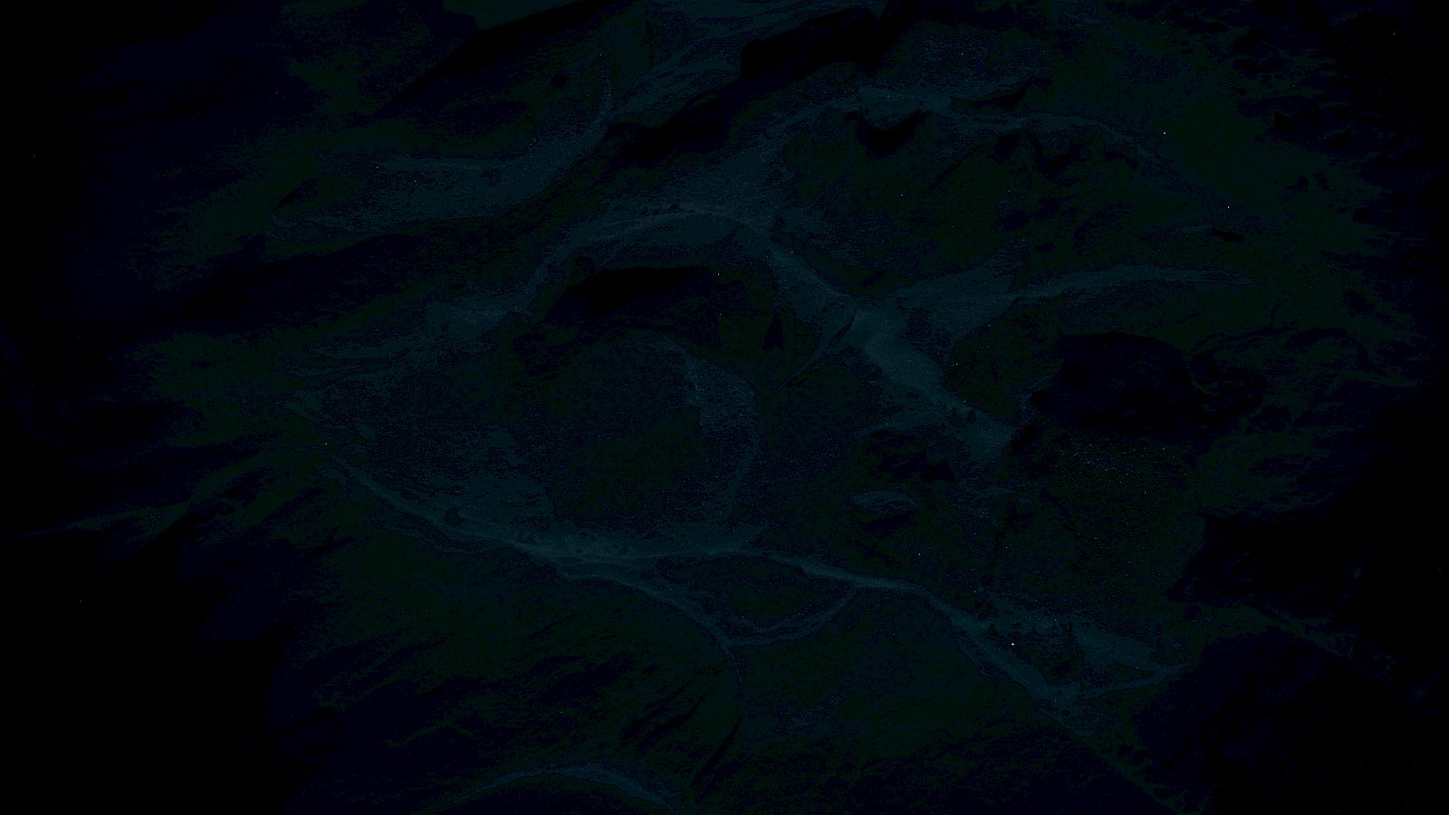 The image is too dark to make out any clear details.